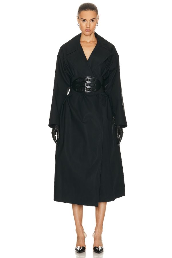 ALAÏA Belted Trench Coat in Noir - Black. Size 42 (also in ).