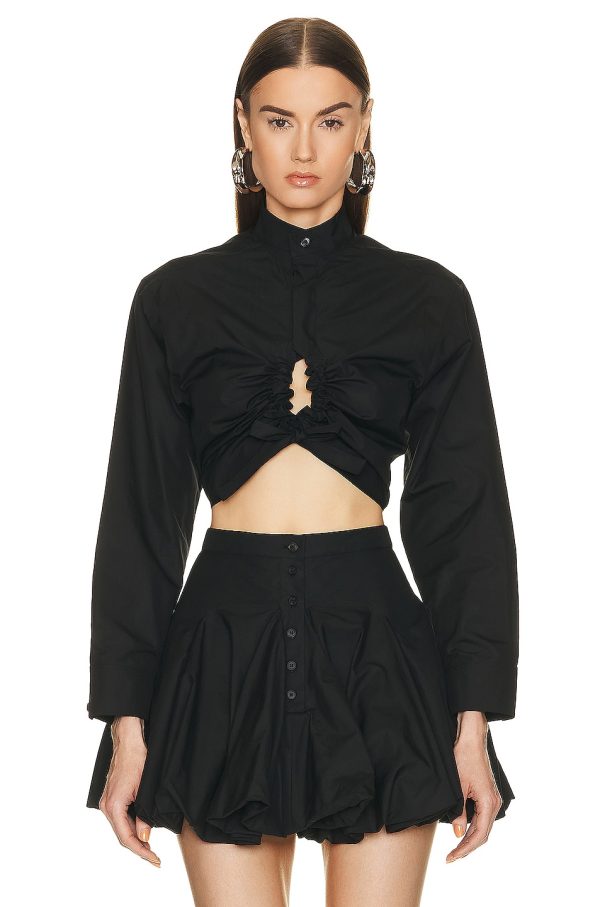 ALAÏA Cropped Shirt in Noir - Black. Size 42 (also in ).