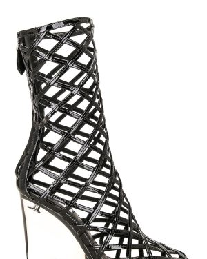 ALAÏA Wedge Boot in Noir - Black. Size 36 (also in ).