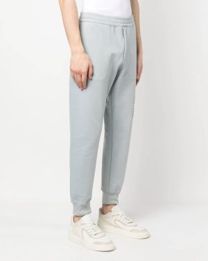 ALEXANDER MCQUEEN GRAFFITI PRINT JOGGERS Size: S, colour: GREY