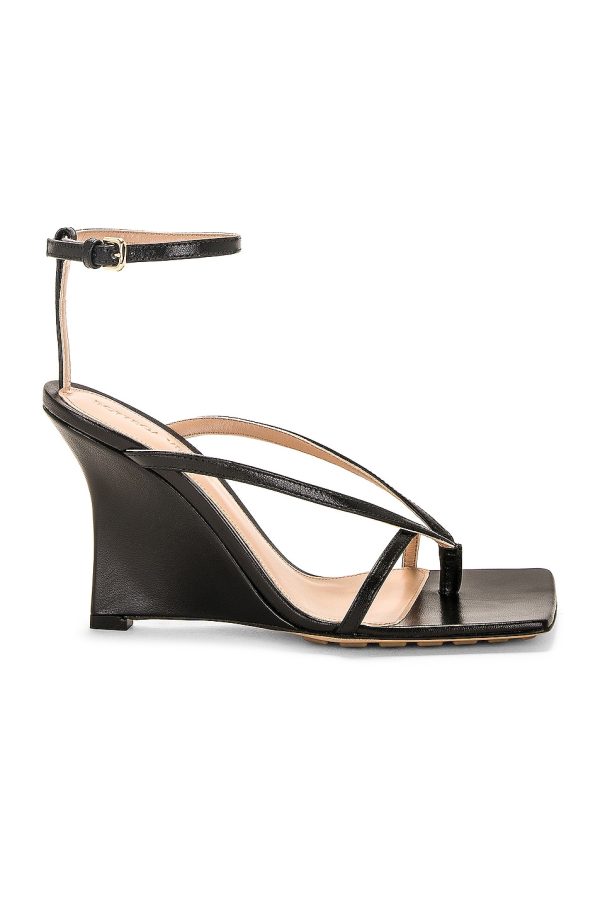 Bottega Veneta Stretch Ankle Strap Wedge Sandal in Black - Black. Size 36.5 (also in 38.5, 41).