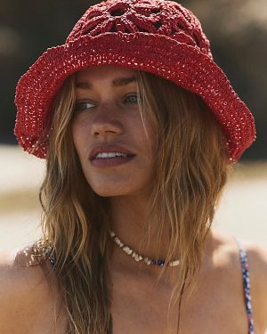 Cut-Out Daisy Straw Hat at Free People in Red