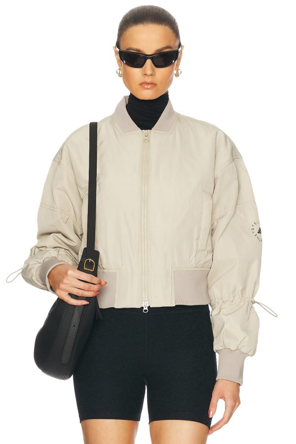 adidas by Stella McCartney Truenature Cropped Bomber Jacket in Desert Sand - Taupe. Size L (also in M, S, XS).