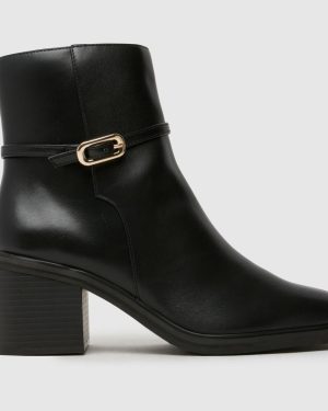 schuh Briley Heeled Buckle Boots in Black