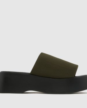 schuh Tash Wedge Mule Sandals in Khaki