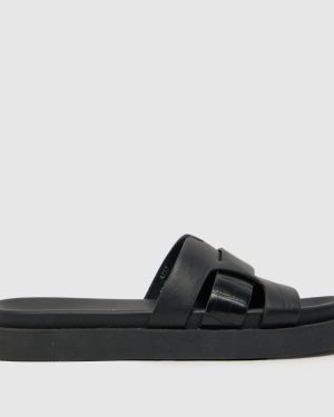 schuh Timmy Croc Footbed Sandals in Black