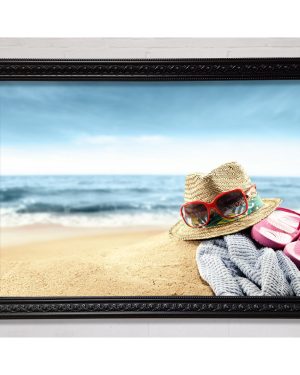 Sun Hat And Sunglasses On The Beach Framed Print