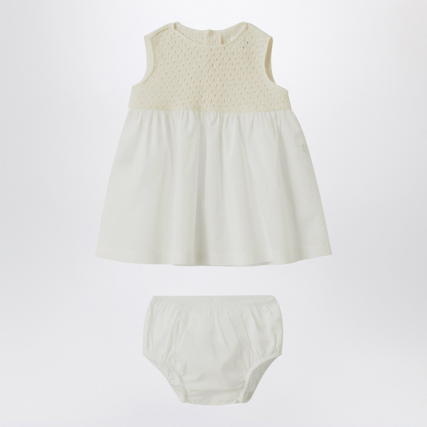 Cream-colored openwork knit dress with voile