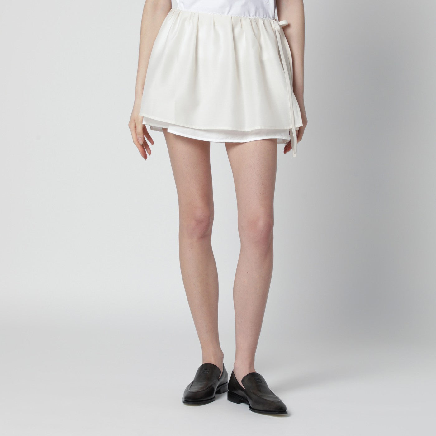 Cream mini skirt with overlapping panel